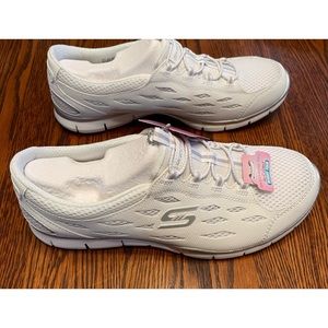 White Sketchers flex with air-cooled memory foam sneakers